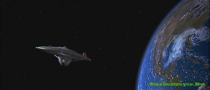 The Enterprise-E orbits Earth. This picture has nothing to do with the page topic, but it looks nice :)